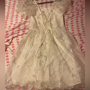 Butterfly detailed white sparkly dress
